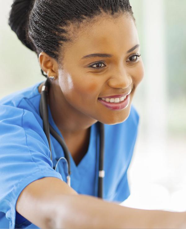 Smiling female nurse or healthcare professional